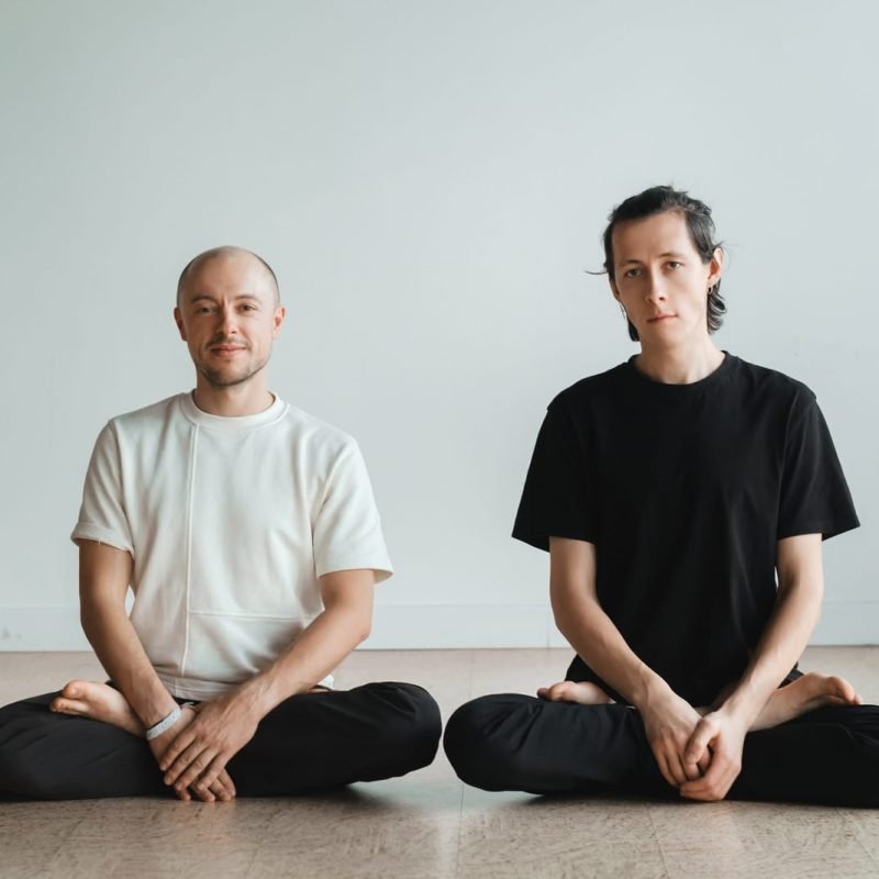 59619744_two-young-athletes-practice-yoga-in-the-gym-joint-training-indoors-studio-the-concept-of-a-healthy-lifestyle